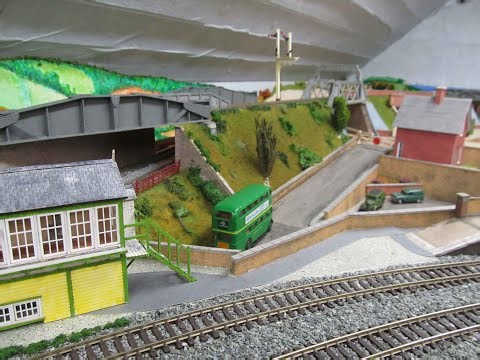 Model railway scenery2, More scenery are added to the eastern embankments using homemade clump turf.