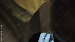 Applying the auto primer on the car body 4K