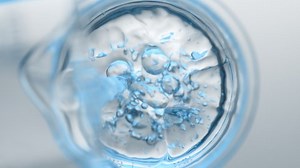 clip-1084201726-light-blue-liquid-pouring-into-beaker-water