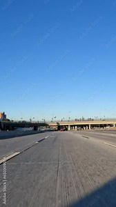 Driving under the Los Angeles 101 freeway interchange sign near downtown LA in Southern California. Vertical view. Stock Video