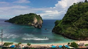 Nusa Penida, Bali: Aerial drone footage of the stunning Atuh beach in the Nusa Penida island in Bali in Indonesia.