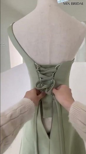 See how to tie a lace-up back bridesmaid dress!