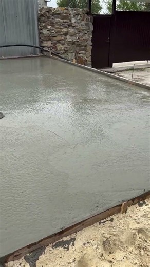 🏗️⚙️ Manual Screed Rail Removal and Surface Leveling on Fresh Concrete Slab