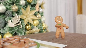 Gingerbread man Dancing in Christmas Cozy Interior on table. 3D animation of funny, hot and sweet cookie boy dancing for holiday and kid event, show, party. Christmas cookie Stock Video