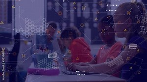 Students using laptops in classroom with data processing animation over them