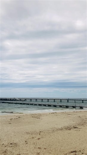 Busselton Jetty is the longest timber-piled jetty in the Southern Hemisphere, stretching 1.841 kilometers over Geographe Bay in Western Australia. It is a popular tourist attraction offering a solar-powered train ride to the end, an underwater observatory to view marine life, and activities like swimming, fishing, and snorkeling. The jetty's submerged structure has also become Australia's largest artificial reef, supporting over 300 species of marine life. #australia #westernaustralia #busselton