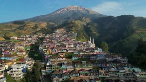 a panoramic aerial view of the fantastic Nepal Van Java, a small and colorful village in the bottom of Mount Sumbing in Central Java, Indonesia