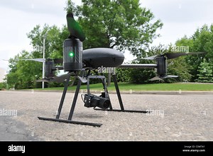 SPY 'COPTER TAKES FLIGHT It's the ultimate surveillance machine. This unmanned mini-helicopter is equipped with wireless video Stock Photo - Alamy