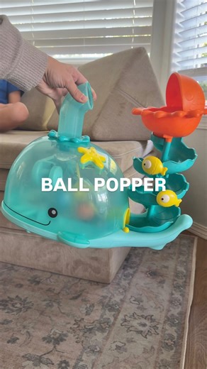Jessica Conboy on Instagram: "The coolest ball popper toy! You can aim the balls into the tunnel or turn the launcher to launch around the room if you need them to get some energy out too! A fun sensory toy for practicing hand-eye coordination! ✨Mention “ball popper” + FOLLOW me and I’ll send you the details! (the follow is so the message doesn’t get blocked) Also linked in my bio 🫶🏻 #toddlertoys #ballpopper"