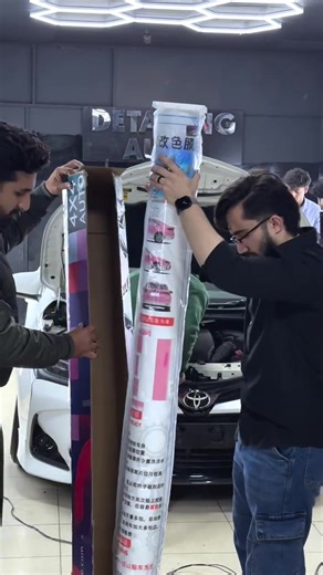 Gloss Customized Pink White Car Vinyl Wrap Check the link in bio to carwraponline.com pick your color. ----Customized car wrap process 1.Send me a private message and tell me your car vin, model number and your design ideas 2. The designer produces the design drawings 3. If the customer is satisfied with the design drawing, they can choose either a glossy or matte finish 4. Factory production and delivery #carwraponline #carwraps #vinyls #glossy #customized