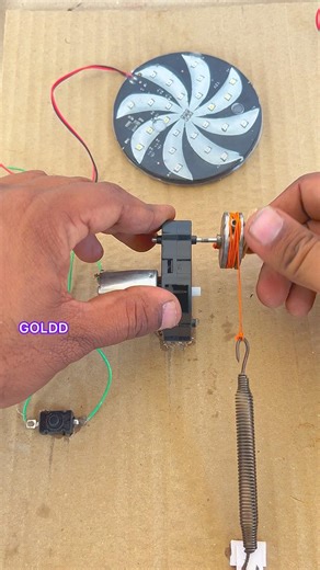Powering cycle wheel light using spring generator#dcmotor #shorts