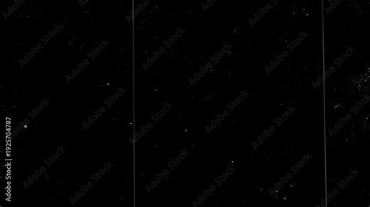 Dirty film grain texture with scratch marks, hair strands and static noise on black background