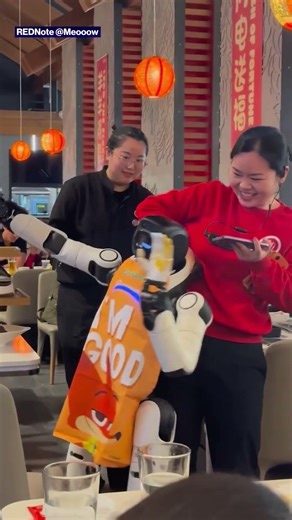 Restaurant staff attempt to restrain dancing robot #shorts