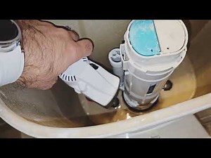 How change a noisy toilet fill valve