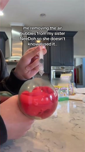 me removing the air bubbles from my sister NeeDoh so she doesn’t know i used it..