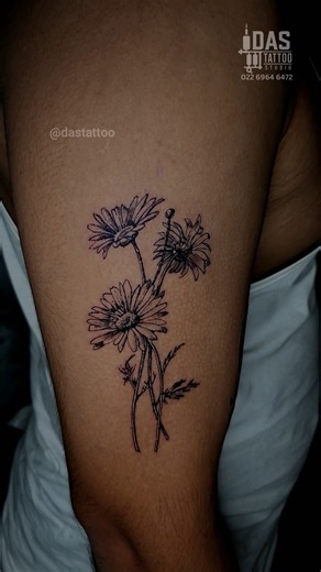 Delicate Fine-Line Daisy Bunch Arm Tattoo #dastattoo #daisytattoo #floraltattoo #finelinetattoo