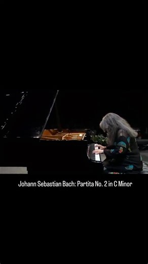 Johann Sebastian Bach on Instagram: "Martha Argerich delivers a breathtakingly vital performance of Bach's Second Partita, where fiery passion and impeccable precision collide. Her interpretation is a whirlwind of technical brilliance and profound musicality. 🎹⚡️ #bach #marthaargerich #partita #cminor #bwv826 #piano #classicalmusic #bachpiano #pianist #classicalpiano #pianoperformance #argerich #classicalperformance #pianosolo #bachpartita #pianogenius #musicmasterpiece #classicalpianist #piano