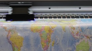 Premium stock video - Modern digital large format uv printer. printing production technologies. uv pinning is the process of applying a dose of low intensity ultraviolet light to a uv curable ink