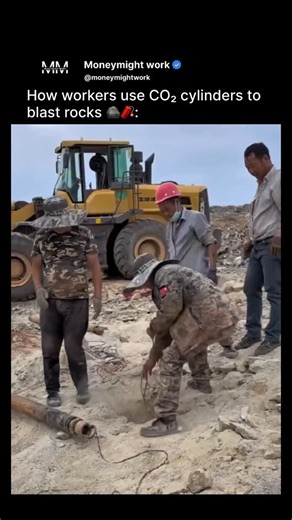 @moneymightwork on Instagram: "Workers use CO₂ cylinders for rock blasting as a safer and more controlled alternative to conventional explosives. The process begins with drilling holes into the rock, after which high-pressure steel cylinders filled with liquid carbon dioxide are inserted and the holes are sealed with stemming material like clay or sand to contain the force. When triggered mechanically or electrically, the liquid CO₂ rapidly expands into gas, generating immense pressure inside th