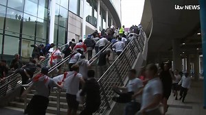 Watch as fans rush past stewards and up steps at Wembley after breaching security ahead of the Euro 2020 final. Read more here: https://www.itv.com/news/2021-07-11/england-v-italy-fans-breach-security-at-wembley-ahead-of-euro-2020-final | ITV News