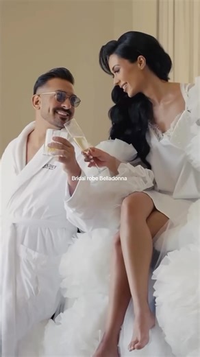Luxury bridal robes and lingerie on Instagram: "Still glowing from this unforgettable moment ✨ Our bride stepped into her Belladonna bridal robe and instantly transformed the room — rich, regal, absolutely breathtaking. Her wedding was a masterpiece of luxury, elegance, and love. One of those days that didn’t just feel beautiful… it felt historic. She looked stunning beyond words — the kind of stunning that makes time slow down. The robe moved like poetry, every detail whispering couture. Here’s