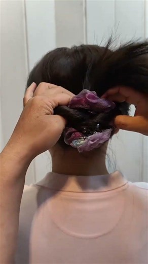 Tired of your ponytail Try different style This chic and effortless way to tie your hair is perfect