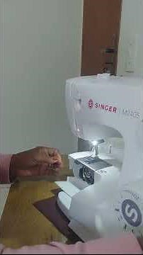 How to put a bobbin in the singer M2405 machine and fish the thread