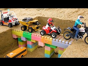 Build bridges with toy construction vehicles
