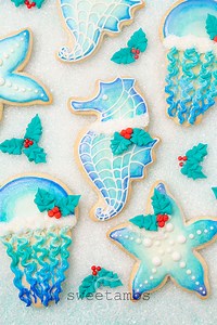 A new month means a new cookie decorating kit for my Baker's Club members! December's cookie decorating kit comes with my signature orange cardamom cookie mix, royal icing mix, decorating bags, food coloring, luster dust, and more to create these beautiful Christmas cookies. Sign up here! https://globalbelly.com/collections/sweetambs/products/sweetambs-bakers-club | SweetAmbs