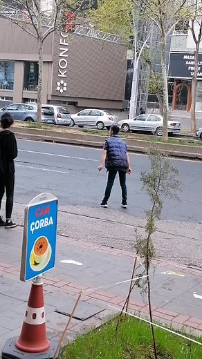 Urban Sidewalk Encounter: Man Running in the City