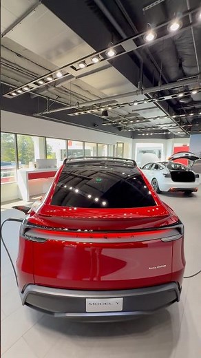 2026 Tesla Model Y Juniper in Ultra Red Exterior | Tesla Logo & Badging