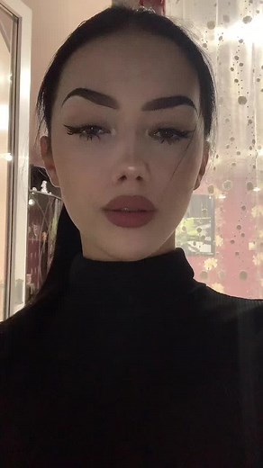 Cozy Room Setting with Dark Haired Individual