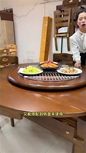 wooden dining table set features a circular design with a foldable sides for space-saving storage.