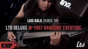 Designed for seriously extended low pitch ranges, the LTD Deluxe M-1007 Baritone EverTune combines seven strings with a 27” baritone scale and the innovative EverTune constant tension bridge, making it one of the most powerful instruments for downtuned guitar performance ever created. Available in an outstanding Granite Sparkle finish, the M-1007 Baritone EverTune offers neck-thru-body construction at 27” scale, pairing an alder body with an extra-thin three-piece maple neck. Its Macassar ebony 
