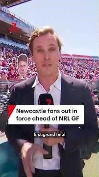 Newcastle Knights fans cheer on their team ahead of NRL grand final