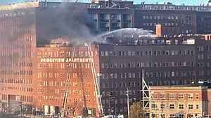 Crews battle fire at downtown Cleveland apartment building
