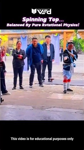 Spinning Top Defies Gravity?! It’s Angular Momentum #shorts #viral