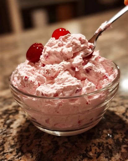 Cherry Fluff Salad Ingredients: 1 can (20 oz) crushed pineapple, drained 1 can (21 oz) cherry pie filling 1 tub (8 oz) Cool Whip, thawed 1 cup mini marshmallows 1 cup cottage cheese 1/2 cup chopped pecans (optional) Directions: 1. Add the drained pineapple and cherry pie filling to a large mixing bowl and stir together. 2. Add cottage cheese and mix until combined. 3. Fold in Cool Whip until evenly blended. 4. Stir in mini marshmallows and pecans if using. 5. Refrigerate for at least 1 hour befo