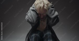 screaming and laughing out of pain