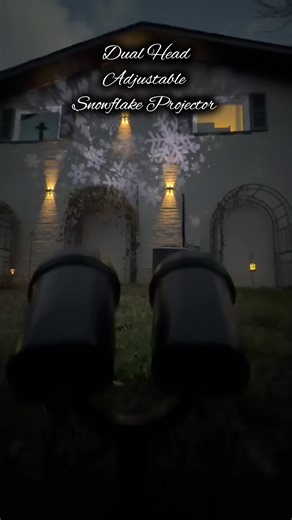 There’s two headed snowflake projection light is easily adjustable and can be mounted or staked into the ground. Create moving snowflake effects on your home or anywhere with the snowflake projector. #snowflakeprojector #outdoorchristmasdecor #christmasdecor #christmasprojector