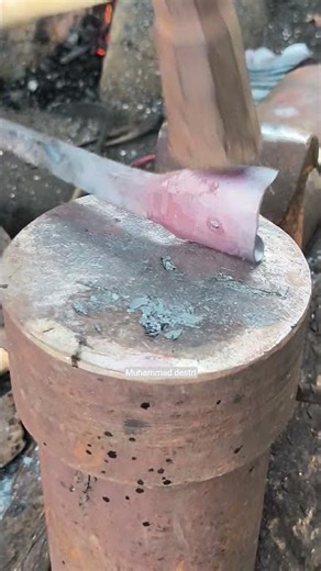 Making a hole on the rubber knife..