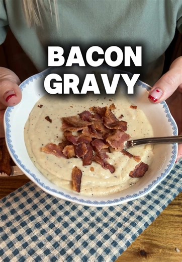 Rustic Country Bacon Gravy 🥓🤎 Good old-fashioned country bacon gravy, just like you’d find in a farmhouse kitchen. Crispy bacon, rich drippings, and creamy gravy made the simple way. Perfect poured over hot biscuits for the ultimate Southern comfort meal. Simple ingredients. Big country flavor. Nothing fancy — just real cooking. 🍳🥓 #CountryCooking #BaconGravy #SouthernFood #BiscuitsAndGravy #RusticCooking