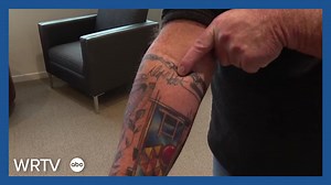 IU patient thanks doctor with a tattoo tribute after spinal surgery