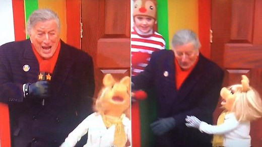 Miss Piggy saves Tony Bennett from falling off Thanksgiving float