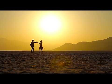 A Silhouette of a Couple Dancing