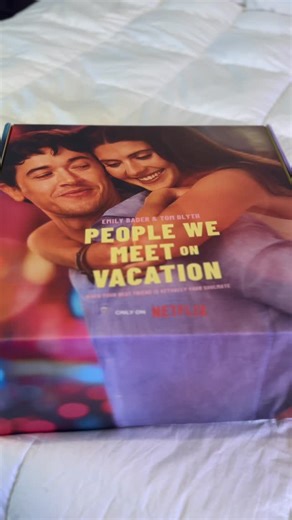 Lindsey | Book Reviewer | TRLBR on Instagram: "FINALLY. The return of a proper rom-com 👏🏻👏🏻👏🏻 It has been so long, and I’m so excited that Netflix picked Poppy and Alex to bring rom-coms back. In the box: Noise canceling earbuds from @bose Sunscreen from @supergoop Sunglasses from @sojosvision Jet Lag Essentials Set from @summerfridays PWMOV branded disposable camera Towel from Teema Cosmetics case from @calpak Raffia tote from @hatattackny Paperback with the movie tie-in cover 🧡💚 Thank 