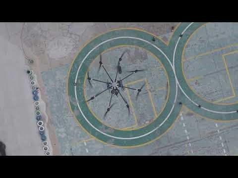 Jinghong Transport Drone Lifting an Electric Vehicle