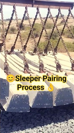 Sleeper rail pairing work in progress for accurate track alignment.