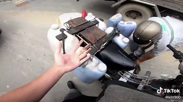Urban Motorcycle Riding Through Busy Streets