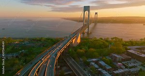 Highways leading to the big beautiful bridge. Stunning view of Bronx Whitestone bridge over magnificent river.